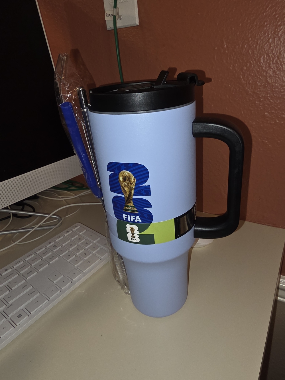FIFA Light Blue Travel Mug with Black Handle and FIFA Graphic
